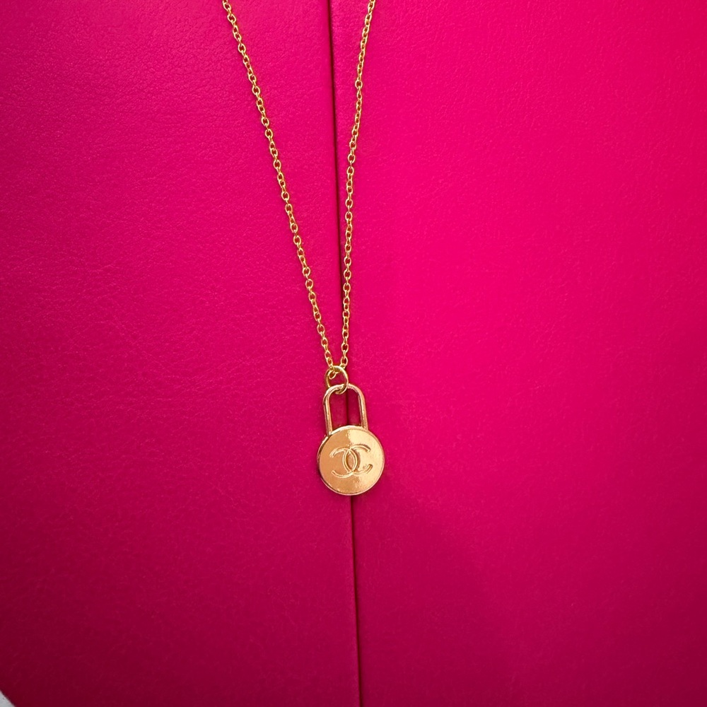 Upcycled Chanel pendant on a necklace